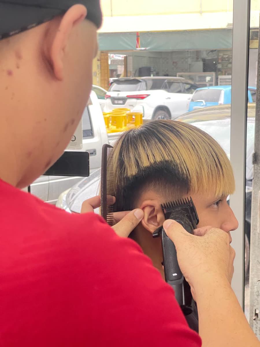 Taper fade kemas di tepi